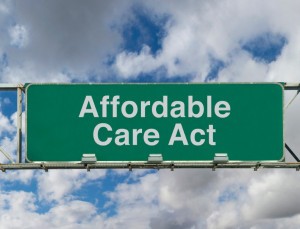 Picture of freeway sign with phrase Affordable Care Act